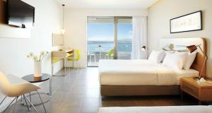 Posteľ alebo postele v izbe v ubytovaní Margarita Sea Side Hotel