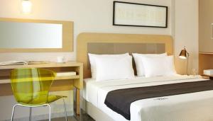 Posteľ alebo postele v izbe v ubytovaní Margarita Sea Side Hotel