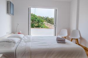 Postel nebo postele na pokoji v ubytování Nice Home Costa Adeje + 9 fotografií