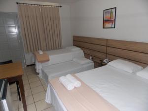 Postel nebo postele na pokoji v ubytování Hotel Mattes