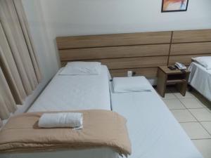 Postel nebo postele na pokoji v ubytování Hotel Mattes