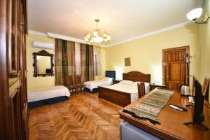 Ένα ή περισσότερα κρεβάτια σε δωμάτιο στο Rose Garden Hotel
