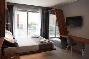 A bed or beds in a room at B&B Rakel Home