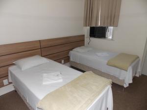 Postel nebo postele na pokoji v ubytování Hotel Mattes