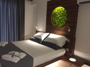 A bed or beds in a room at B&B Rakel Home