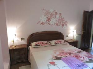 A bed or beds in a room at La Palma
