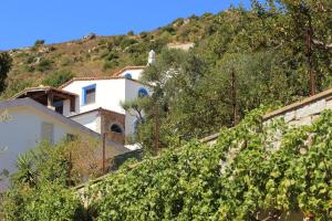 a house on the side of a mountain at Vista Mare in Lanusei