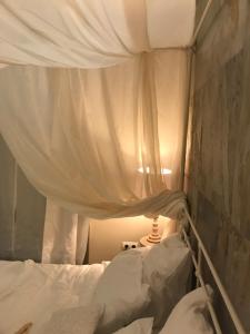 Postel nebo postele na pokoji v ubytování La dimora del Casanova B&B boutique