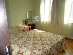 Postel nebo postele na pokoji v ubytování Guest House Lviv Грузия