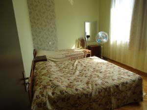 Postel nebo postele na pokoji v ubytování Guest House Lviv Грузия