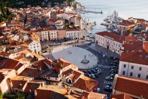 an aerial view of a city with buildings at Vacation Station Piran in Piran