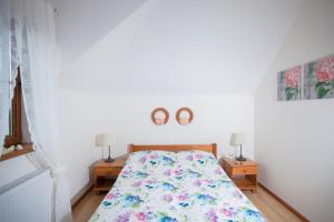 Postel nebo postele na pokoji v ubytování Willa Rogowskich