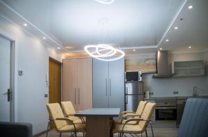 A kitchen or kitchenette at Camp Nou, Europa Fira - modern two-bedroom apartment with heating Még 37 kép