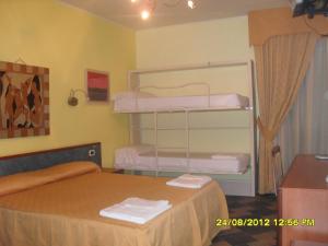 Postel nebo postele na pokoji v ubytování Hotel Blumentag