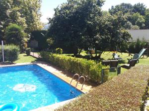 The swimming pool at or close to Apartamentos El Cazador