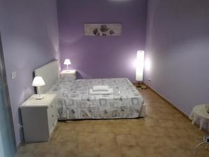 Katil atau katil-katil dalam bilik di La rosa sul lago