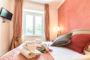Postel nebo postele na pokoji v ubytování Hotel Tenda Rossa