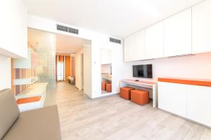 TV a/nebo společenská místnost v ubytování Hotel Tenda Rossa