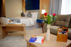 Un lugar para sentarse en Al Mansour Suites Hotel