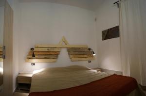 En eller flere senger på et rom på Sa Tanca de Mannoi