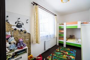 Postel nebo postele na pokoji v ubytování Hotel Na Farmě Choťovice