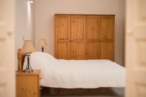 Postel nebo postele na pokoji v ubytování Sant Orsla Suite