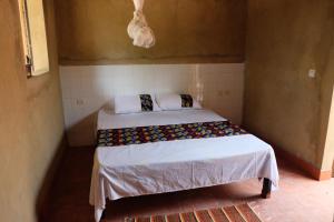 
Cama o camas de una habitación en Centre Touristique et Culturel Casamance
