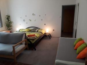 Postel nebo postele na pokoji v ubytování Apartmány Karlštejn