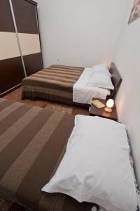Кровать или кровати в номере Apartment Vužar