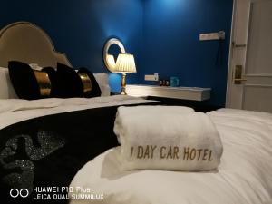 Postel nebo postele na pokoji v ubytování 1 Day Car Hotel Station 18