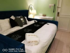 Postel nebo postele na pokoji v ubytování 1 Day Car Hotel Station 18