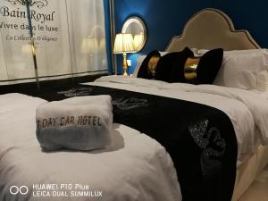 Postel nebo postele na pokoji v ubytování 1 Day Car Hotel Station 18