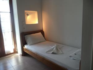 Posteľ alebo postele v izbe v ubytovaní Ilis Villas