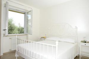 A bed or beds in a room at Bio Forester