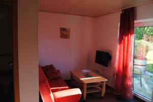 TV a/nebo společenská místnost v ubytování Landgasthof Gruss