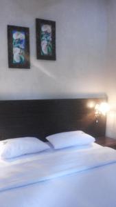 Voodi või voodid majutusasutuse RF Hotel toas