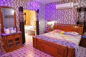 Krevet ili kreveti u jedinici u okviru objekta Pushkar Cooking Art and Home Stay