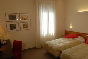 Posteľ alebo postele v izbe v ubytovaní Albergo Al Sole