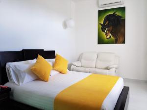 Katil atau katil-katil dalam bilik di Hotel San Jeronimo Armenia