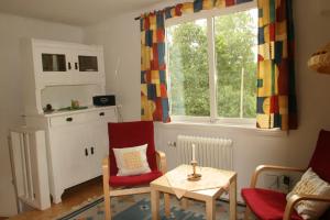 Posezení v ubytování Bed & Breakfast Björkhyddan