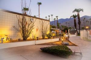 a building with plants on the side of it at Ocotillo Lodge in Palm Springs