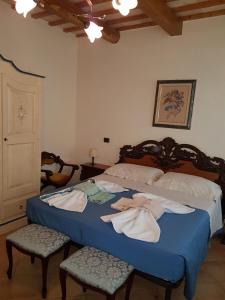 A bed or beds in a room at B&B Antica Fonte del Latte