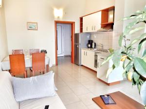 Kuchyň nebo kuchyňský kout v ubytování Apartments Kovacic + 34 fotografií