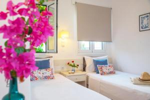 Posteľ alebo postele v izbe v ubytovaní Melissa Apartments, Studios & Suites