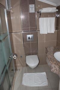 Ванная комната в Ida Hotel