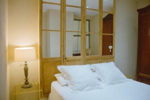 Postel nebo postele na pokoji v ubytování Apartamento Bizcocheros con piscina y jardín privado