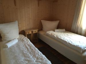 Ліжко або ліжка в номері Lofoten Fishing