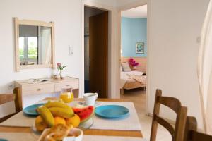 Posteľ alebo postele v izbe v ubytovaní Melissa Apartments, Studios & Suites