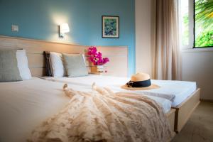 Posteľ alebo postele v izbe v ubytovaní Melissa Apartments, Studios & Suites