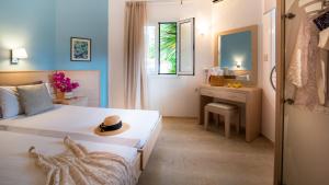 Posteľ alebo postele v izbe v ubytovaní Melissa Apartments, Studios & Suites